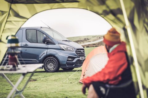 A custom msrt being viewed from inside a tent