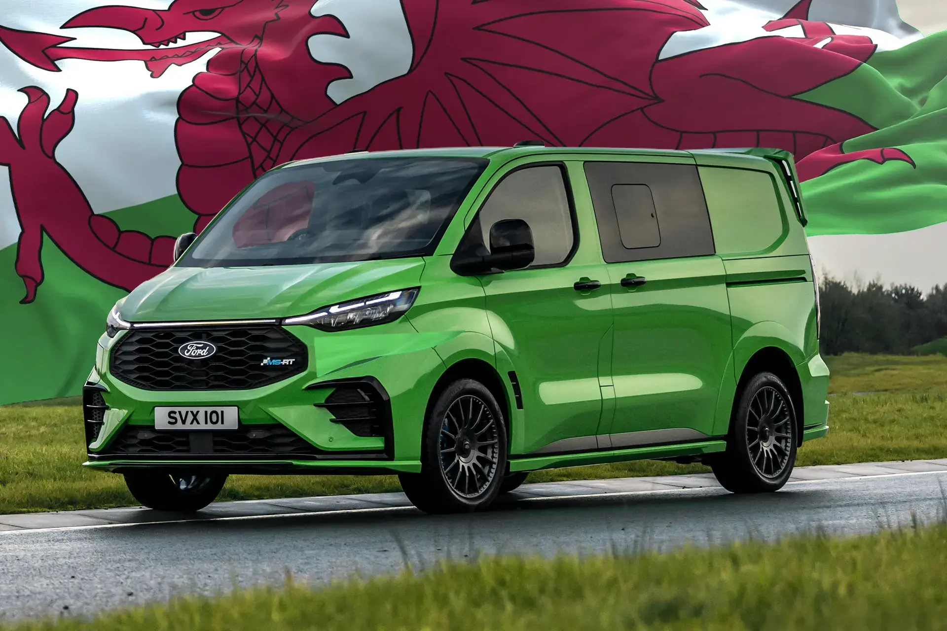 The Ford Transit Custom MS-RT on a track with the Welsh flag behind it