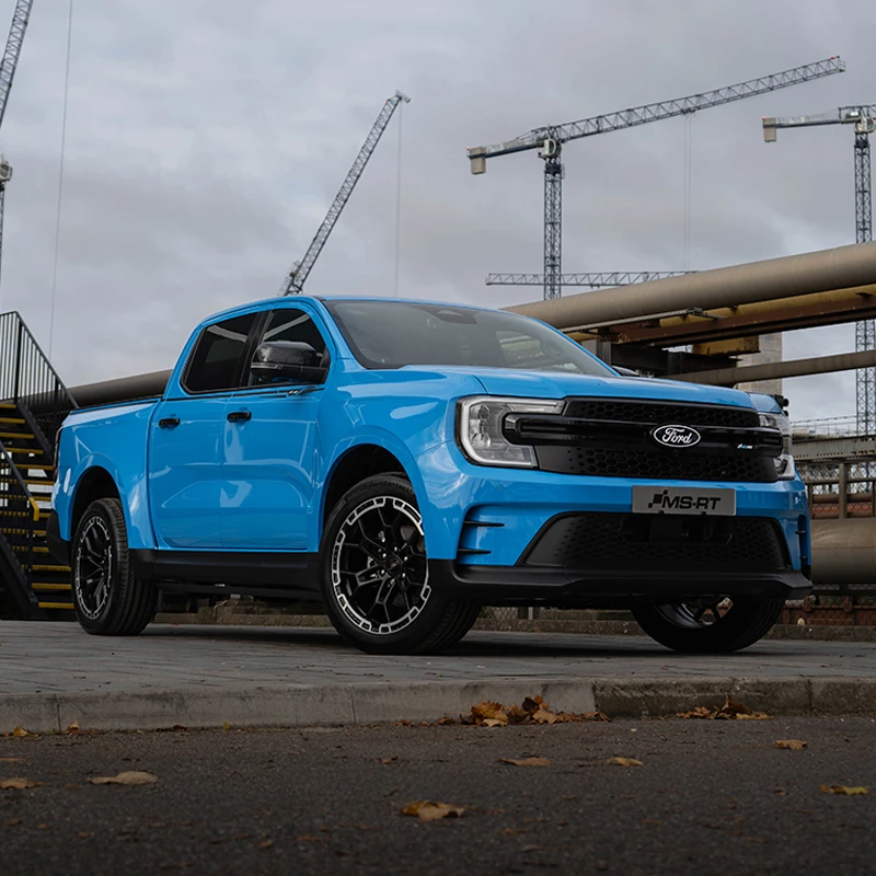 a fast blue Ford Ranger MS-RT at a work site