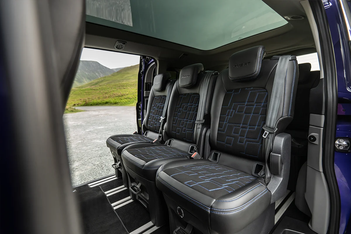 Flexible 8-seat configuration with track-mounted seating system. 